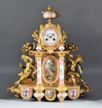 A 19th Century French Gilt Metal and Porcelain Mounted Mantle Clock by S Martie & Cie, the case