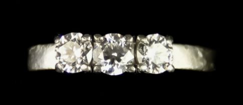 A Platinum Three Stone Diamond Ring, set with three brilliant cut white diamonds, approximately .