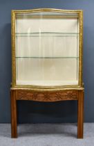 A "George II" Style Mahogany and Parcel Gilt Display Cabinet, the upper part fitted two plate