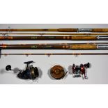 A Small Collection of Fishing Related Material, including eight rods, six reels, some by Abu and