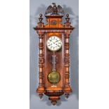 A 19th Century Walnut Cased 'Vienna' Regulator Clock the 6.25ins dial with Roman numerals to the two