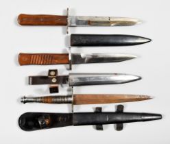 Three World War II Fighting Knives, comprising - one German by Hat dated 1942, single-edged bright