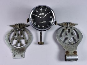 A Jaeger Car Clock, the case stamped X27921 and 721323, the 3ins dial with Roman numerals, and two