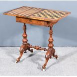 A Victorian Figured Walnut Games Table, the folding top inlaid with rosewood and satinwood chess and