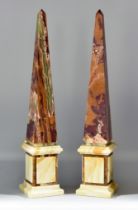 A Pair of Grand Tour Variagated Marble Obelisks, 19th/20th Century, on square plinth bases, 28ins