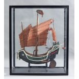 An Early 20th Century Painted Wood Model of a Junk, Circa 1931, 19ins wide x 22ins high, on shaped