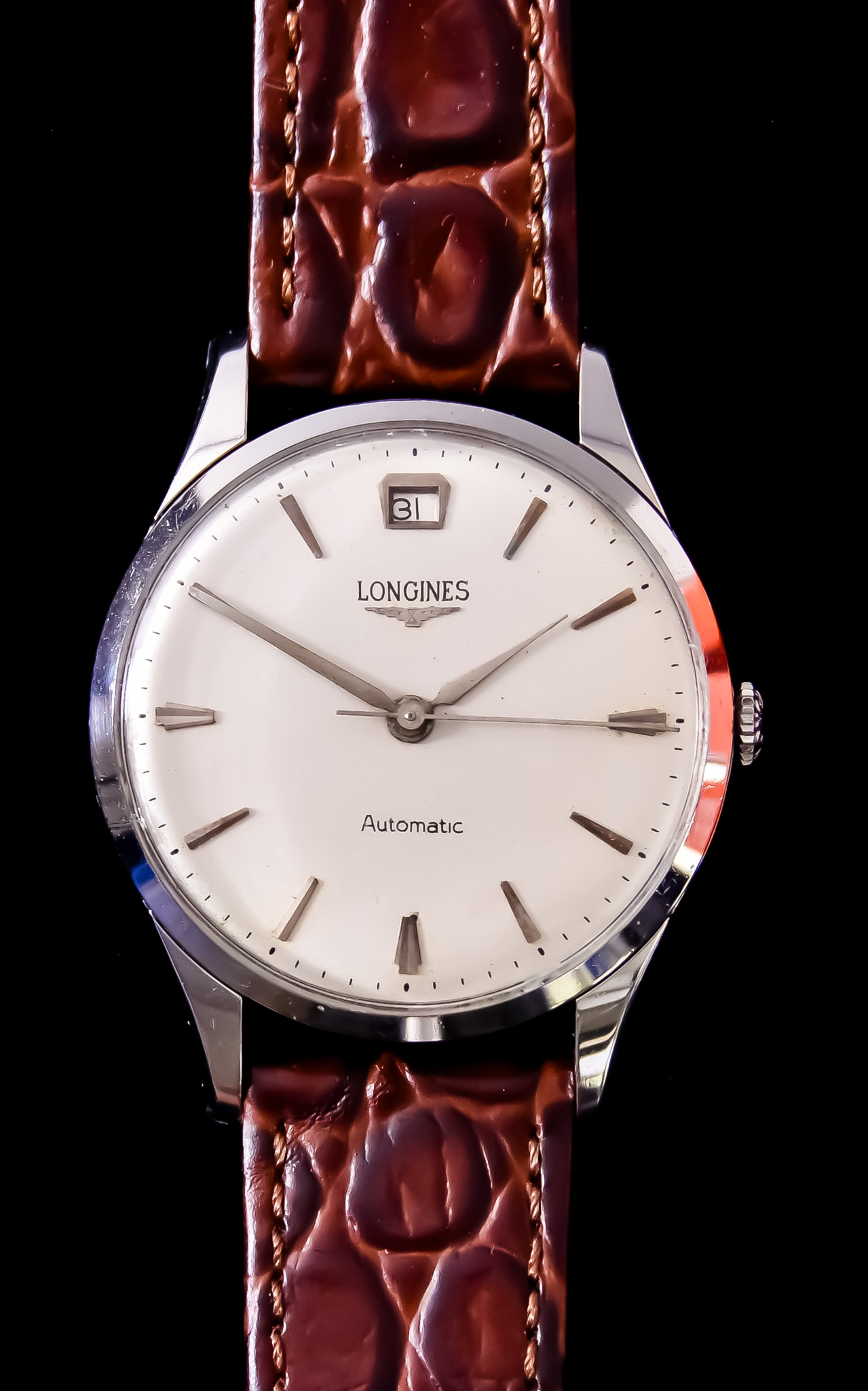 A Gentleman's Automatic Wristwatch, by Longines, 35mm diameter stainless steel case, silvered dial