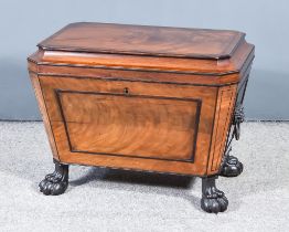 A George IV Panelled Mahogany and Ebonised Wine Cooler/Cellarette, of sarcophagus form, on carved