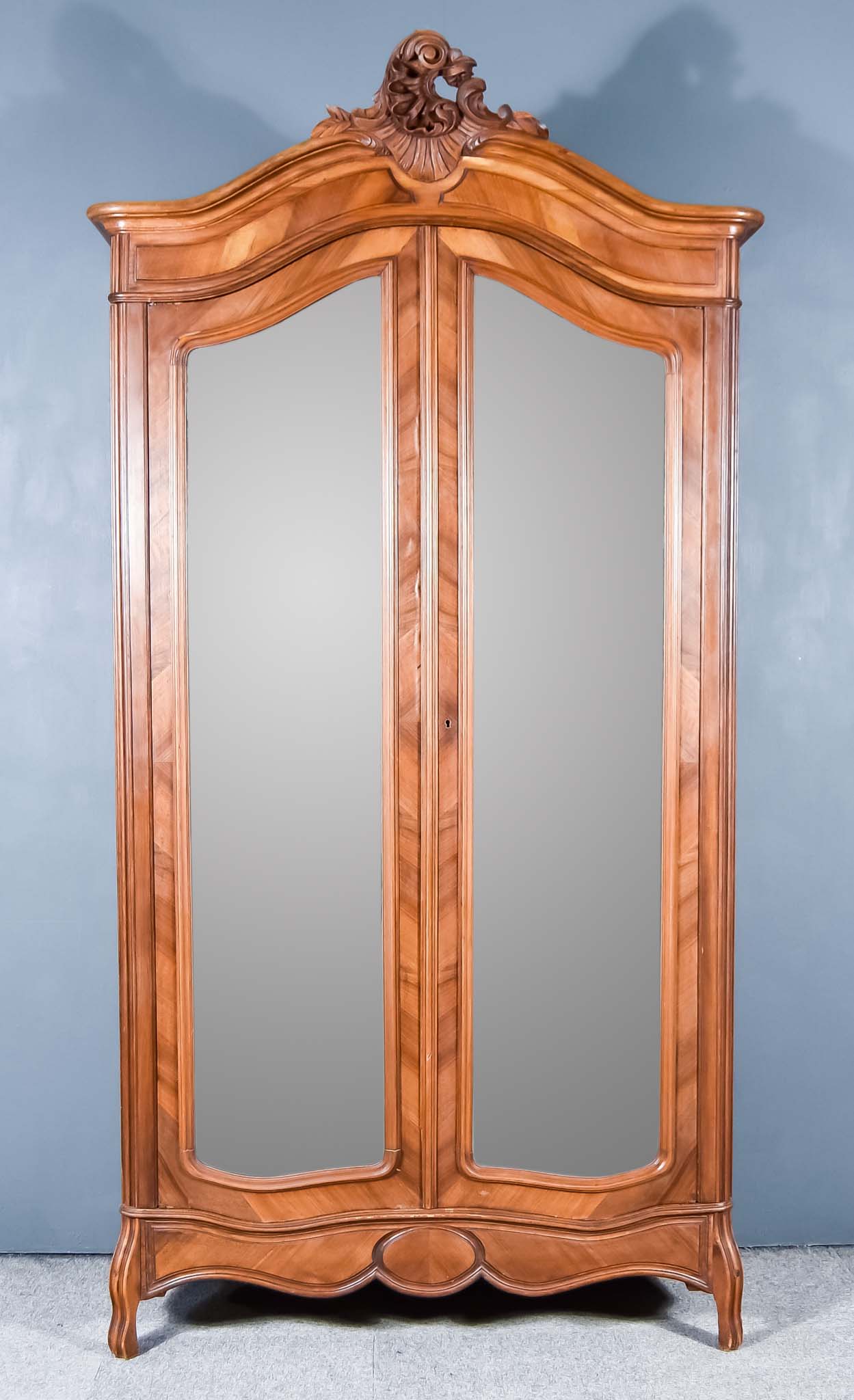 A Late 19th/Early 20th Century French Kingwood and Marquetry Armoire, with moulded and shell and