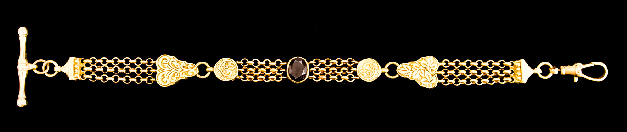 A Yellow Metal Albertina Chain, set with gem stone, 200mm overall, gross weight 17g Note: Metal