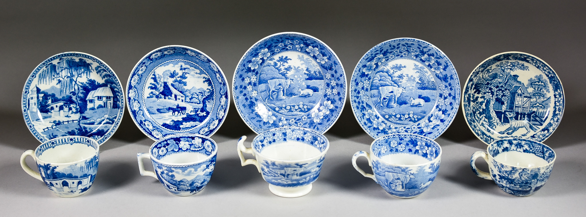 A Collection of Miniature Blue and White Transfer Printed Cups and Saucers, Early 19th Century,