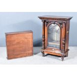 A 19th Century Walnut Cased "Penny in the Slot" Polyphone retailed by Douglas & Co, South Street,