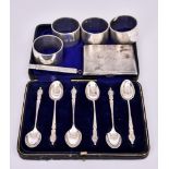 Four Elizabeth II Silver Circular Napkin Rings and Mixed Silverware, the napkin rings by D. Bros.