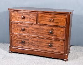 A Victorian Chest with square edge to top, fitted two short and two long drawers, on plinth base