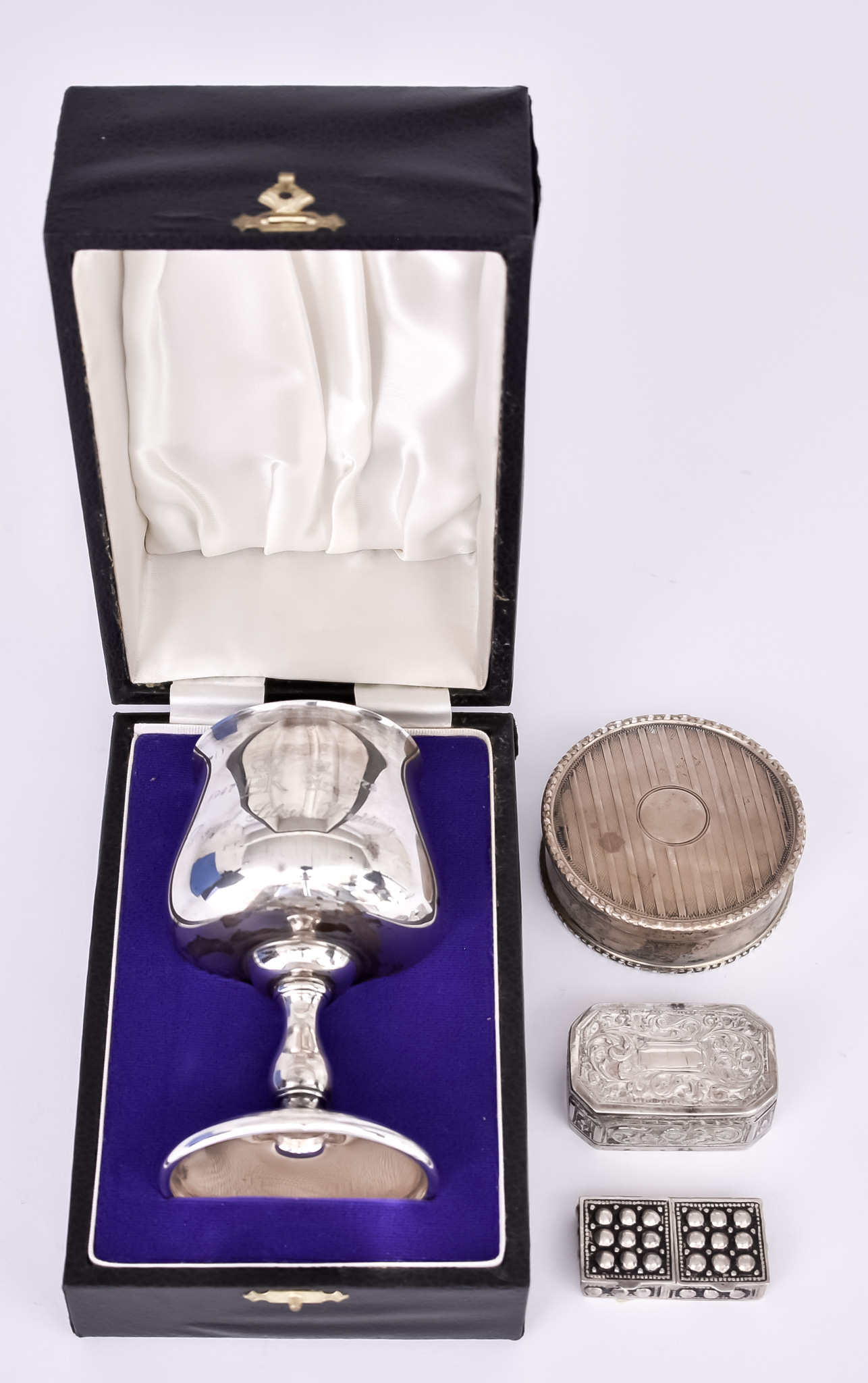 An Elizabeth II Silver Commemorative Goblet and Mixed Silverware, the goblet by A.T. Cannon,