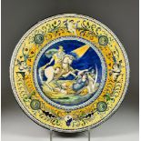 An Italian Maiolica Dish in Renaissance Style, Late 19th Century, the centre painted with a battle