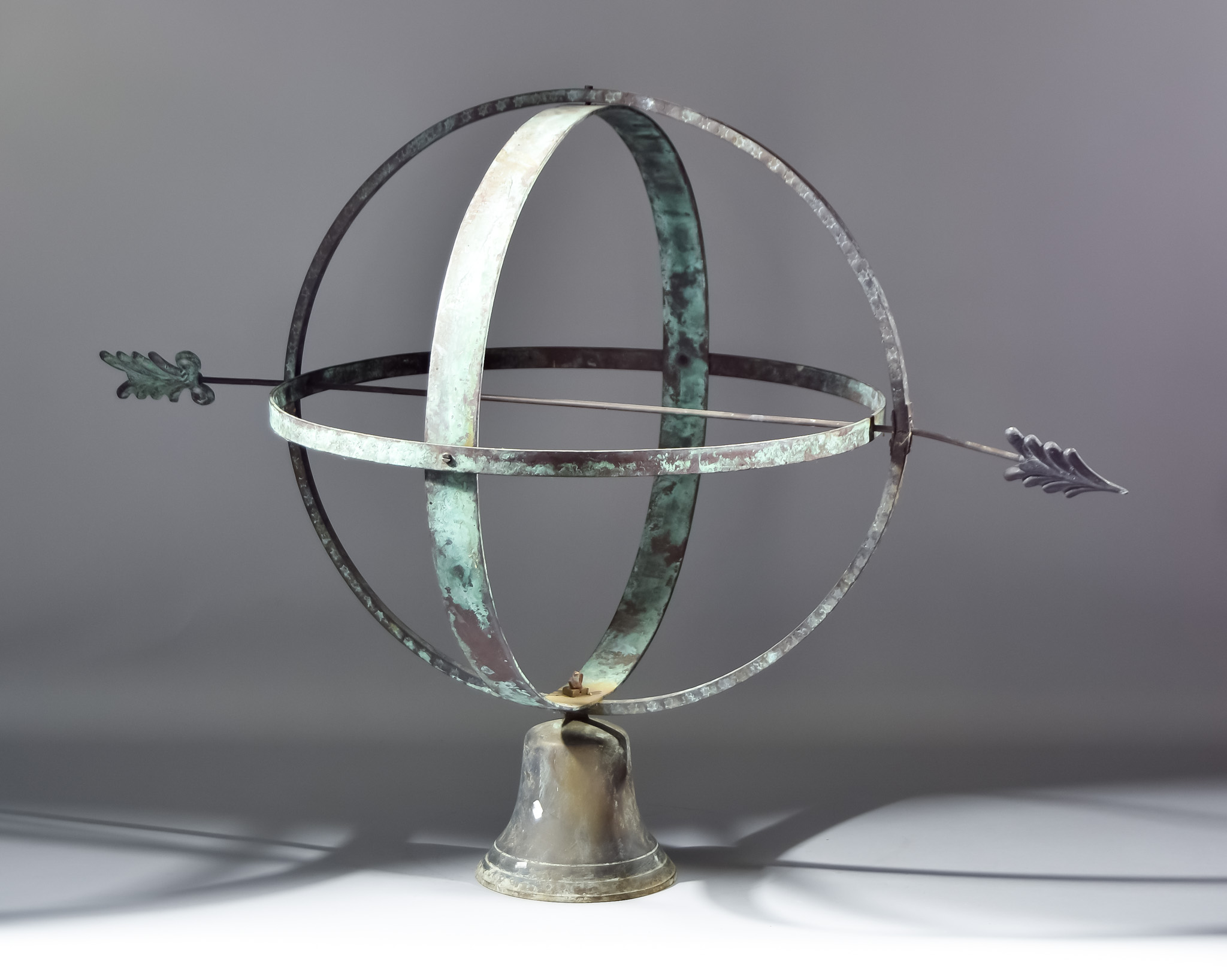 A Copper and Brass Armillary Sphere, 20th Century, on bell-shaped base, 24ins high There are Roman