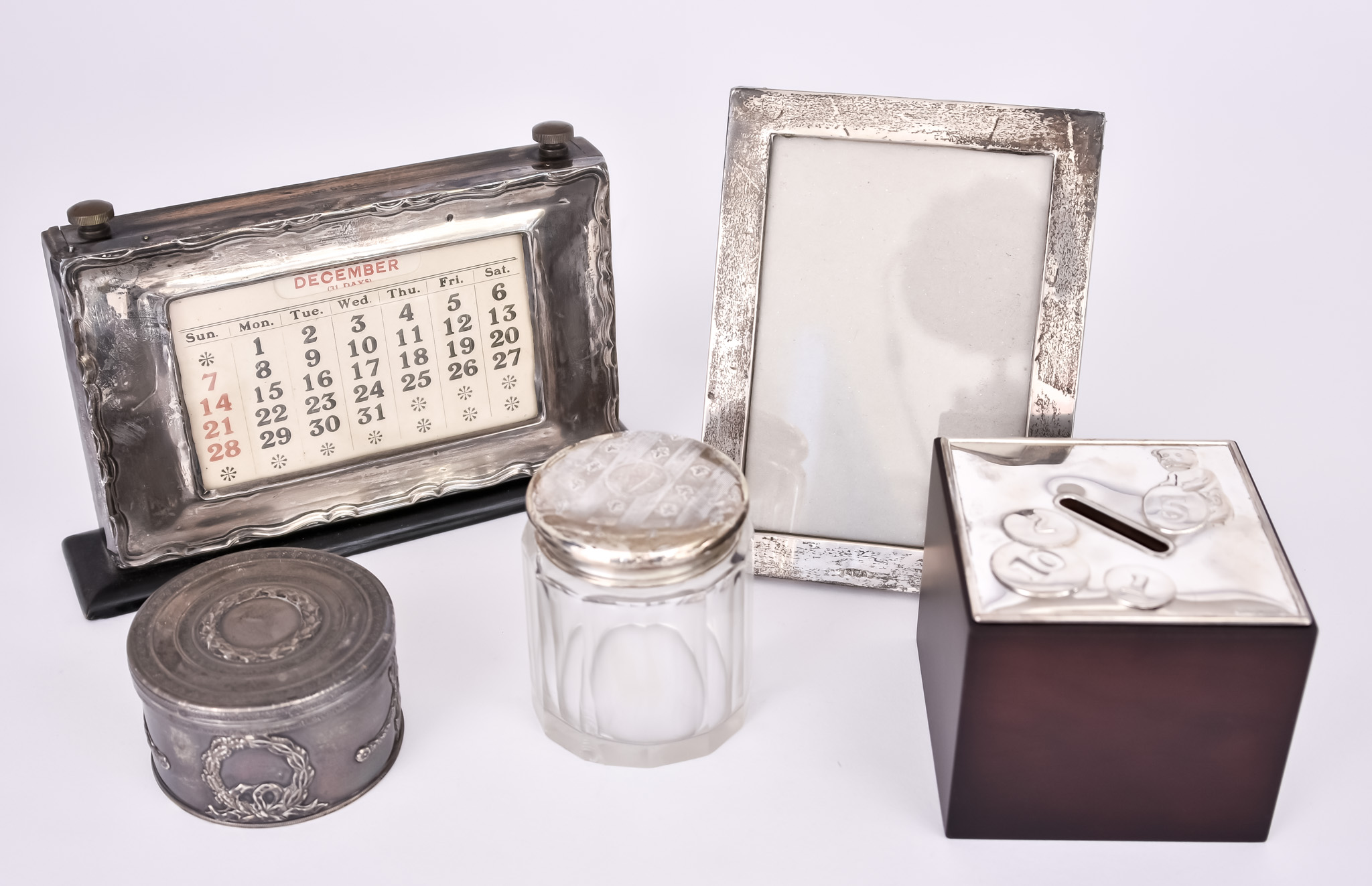 An Early 20th Century French Silver Circular Box and Cover and Mixed Silver and Silver Mounted