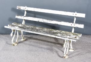 A Late Victorian White Painted Garden Bench, in the Coalbrookdale manner, with wooden slatted back