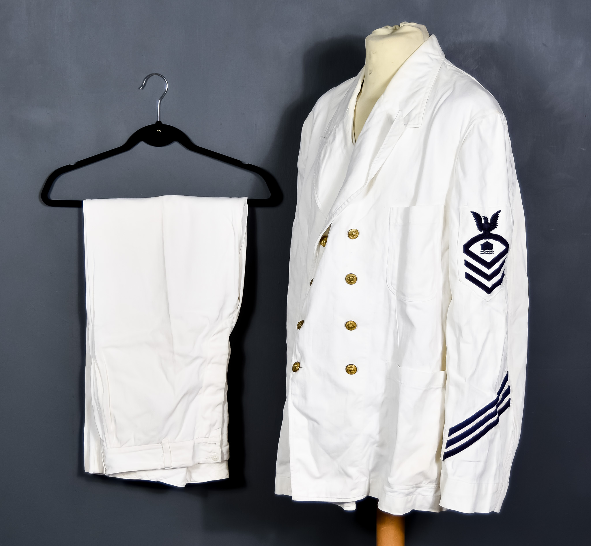 A WWII American Naval "White" Uniform, by Kroskins, Granbury Street, Norfolk, VA, comprising -