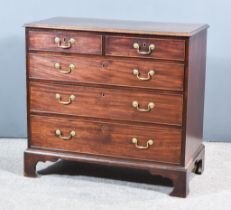 A George III Mahogany Chest, with moulded edge to top, fitted two short and three long graduated