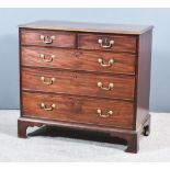 A George III Mahogany Chest, with moulded edge to top, fitted two short and three long graduated