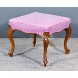 A Victorian Square Stool, the seat upholstered in purple cloth, on leaf capped and scroll cabriole