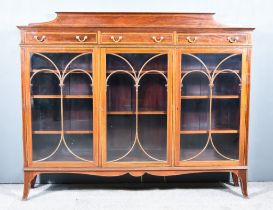 An Edwardian Inlaid Mahogany Dwarf Bookcase, by Maple & Co, London and Paris, the whole inlaid