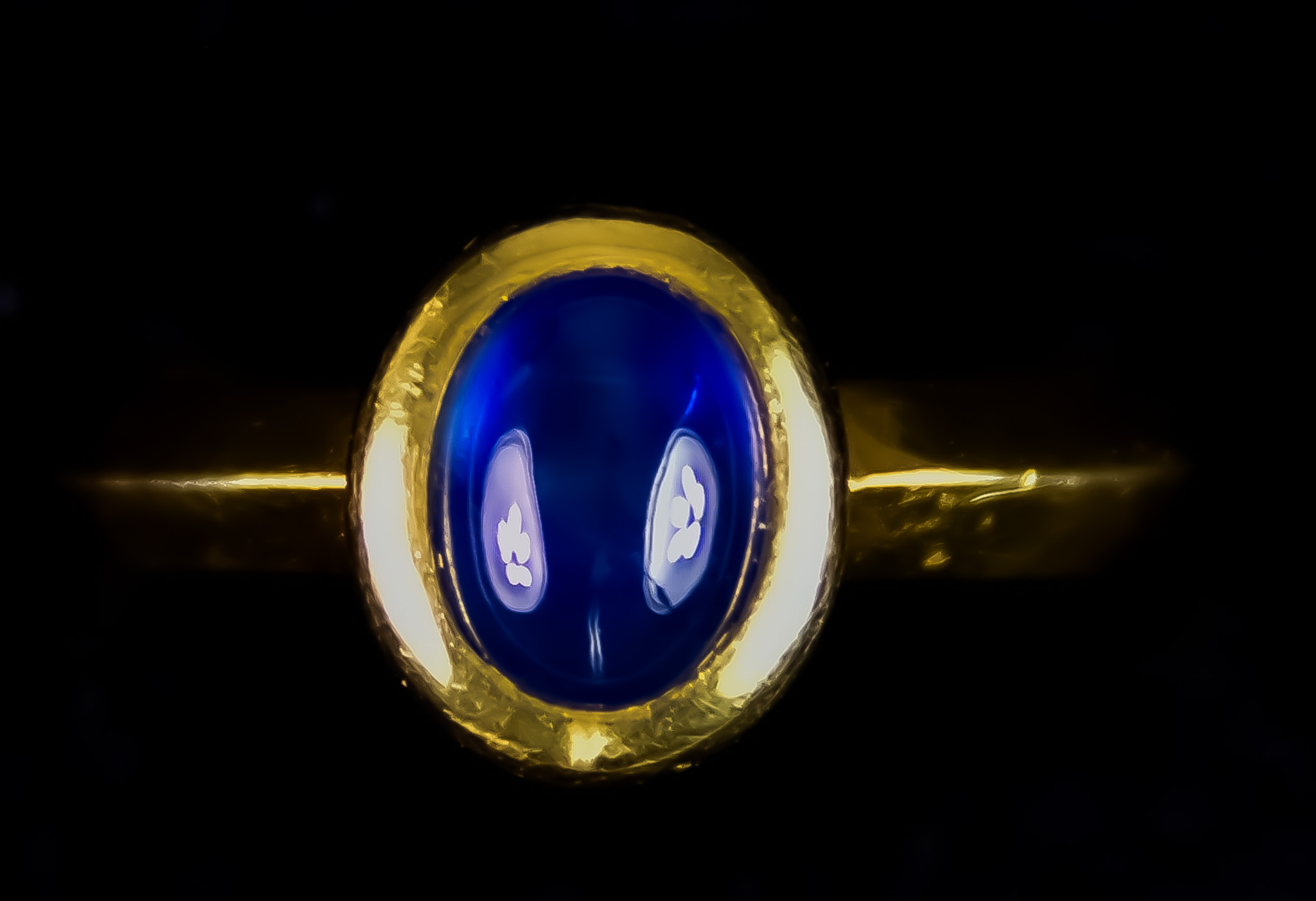 An 18ct Gold Modern Sapphire Ring, set with a cabochon sapphire, approximately 1ct, size M+, gross