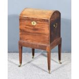 A George III Mahogany Rectangular Dome Topped Two Handled Cellarette, the whole inlaid with