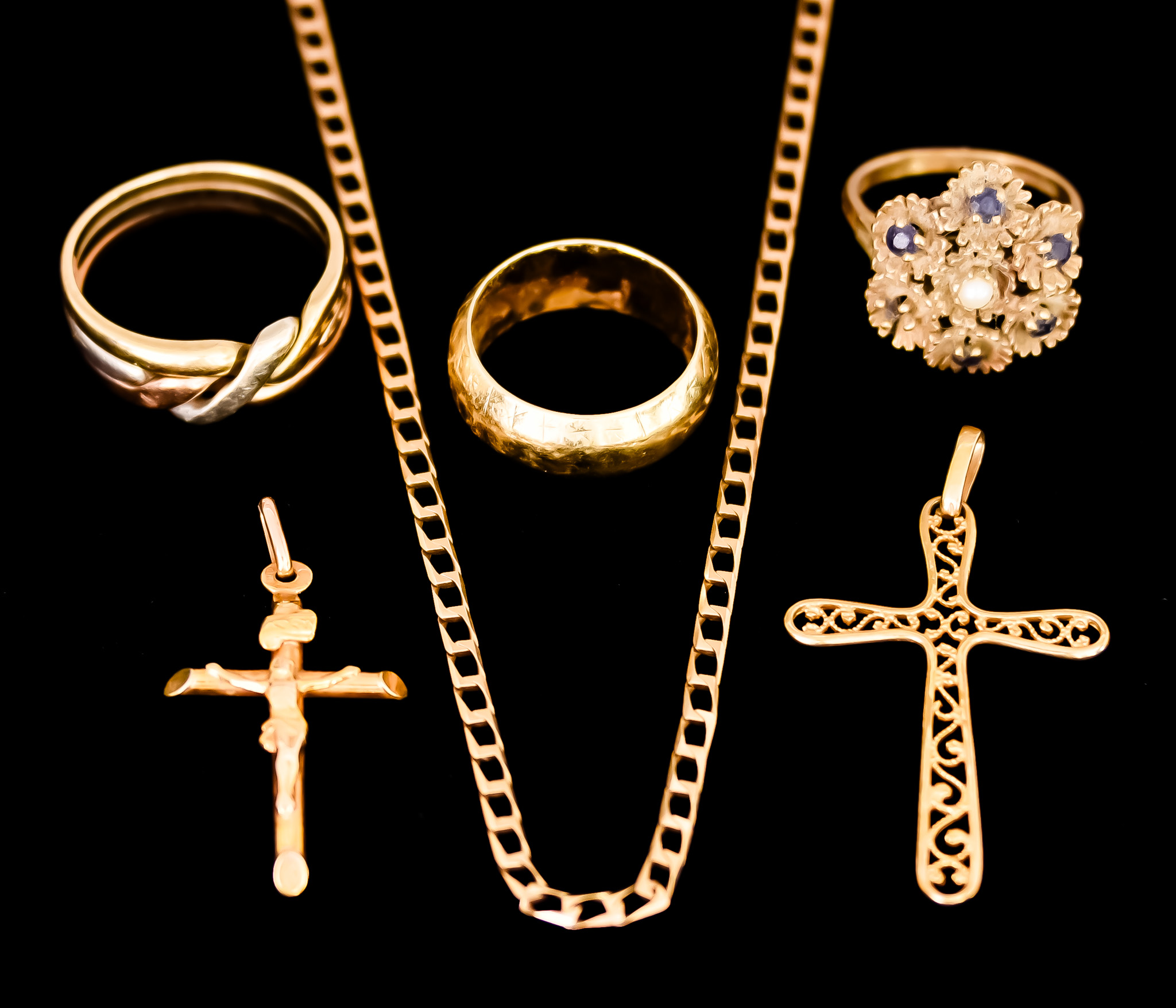 A Quantity of 9ct Gold, comprising - flat curb chain, 500mm overall, crucifix, 30mm x 20mm, filigree