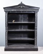 A Late Victorian "Aesthetic" Movement Ebonised Open Front Dwarf Bookcase, with architectural