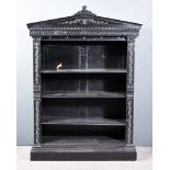 A Late Victorian "Aesthetic" Movement Ebonised Open Front Dwarf Bookcase, with architectural