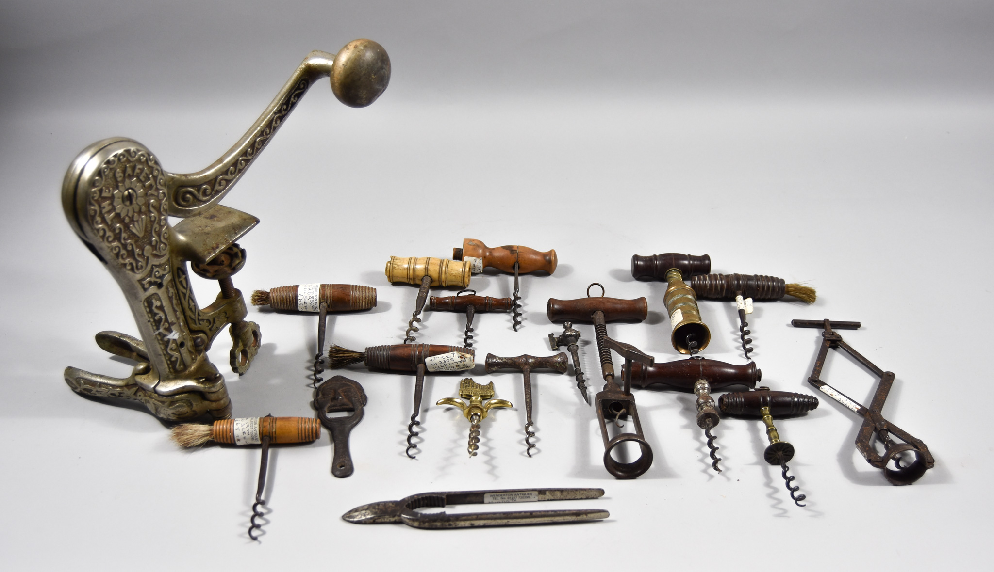 A Selection of Twenty-Two Corkscrews and Bottle Openers, 19th/20th Century, including two