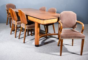 A 1930s Walnut, Figured Walnut and Ebonised Rectangular Extending Dining Table, with one extra