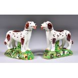 A Pair of Staffordshire Pottery Model Dogs, Early 20th Century, painted with brown markings and