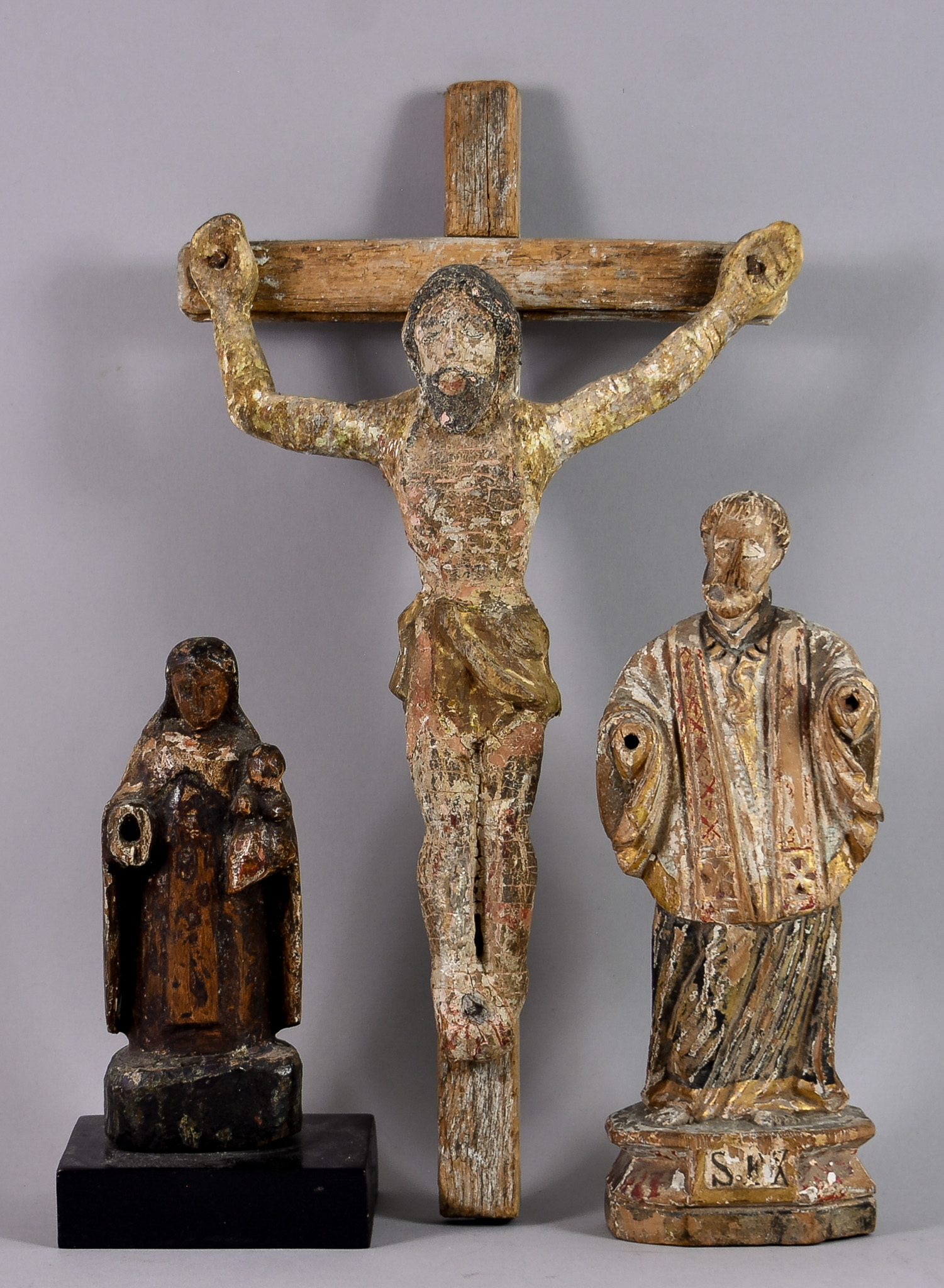 A 20th Century Carved Wood Corpus Christi, with original polychrome decoration, 13ins overall, a