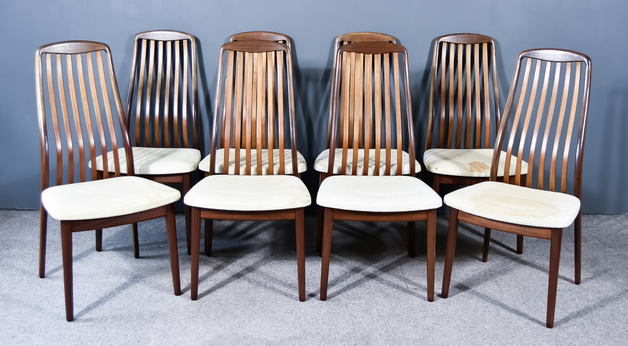 Svend Aage Madsen (1913-2000) - A set of eight mid-century teak dining chairs, with ergonomic backs,