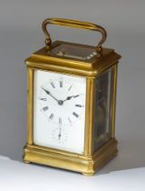 A Late 19th Century French Gilt Brass Carriage Clock retailed by Ollivant & Botsford of