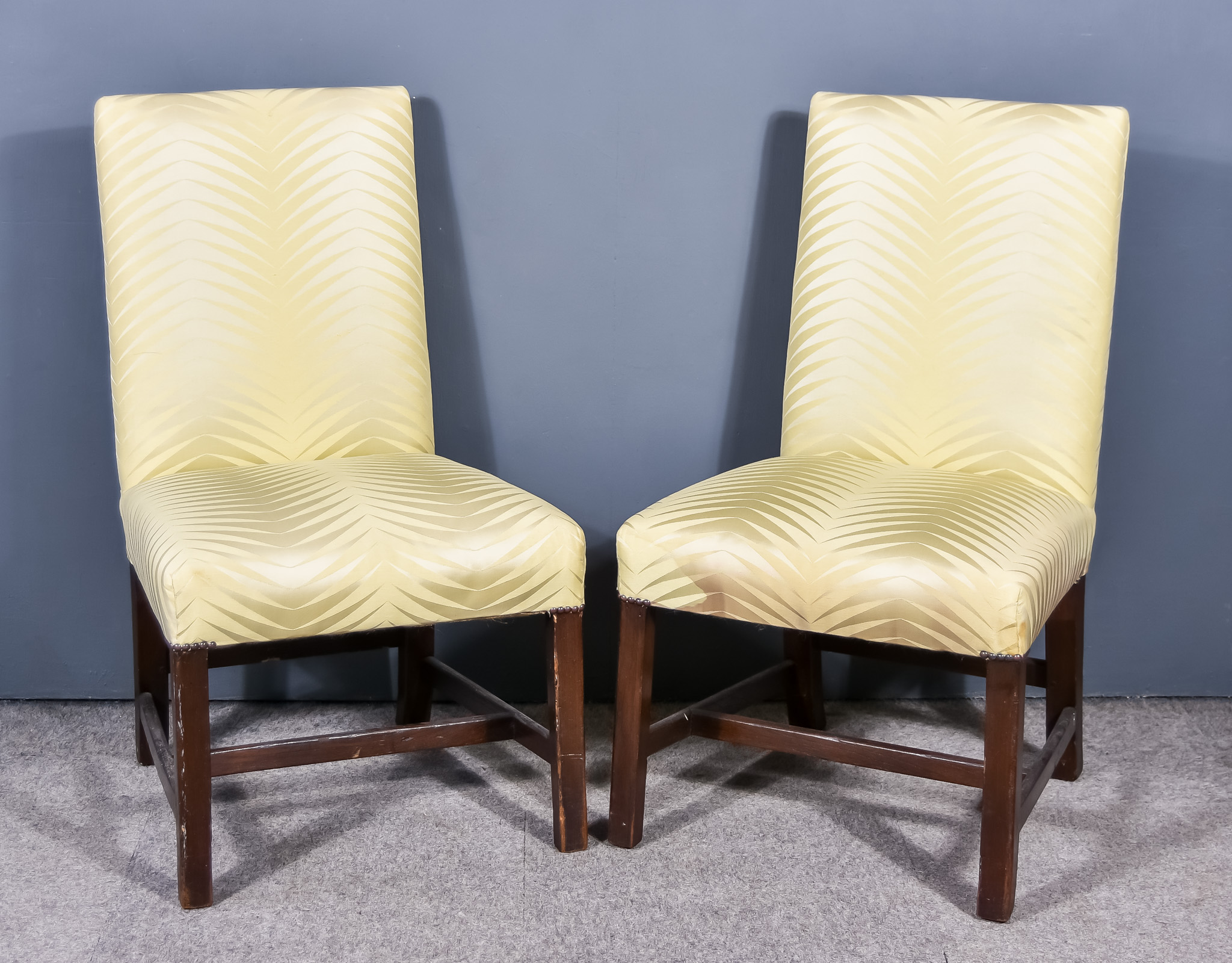 A Pair of 19th Century Square Back Easy Chairs, the backs and seats upholstered in cream striped