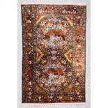 A 20th Century Anatolian Part Silk Picture Rug woven in colours of pale blue, fawn and wine, the