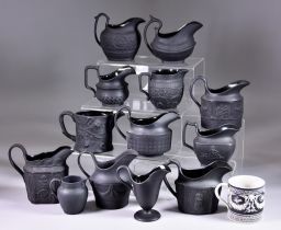 A Quantity of Black Basalt Jugs, 19th Century, various manufacturers and sizes and an early Wedgwood