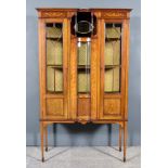 An Edwardian Mahogany and Inlaid Display Cabinet, with moulded edge to top, frieze inlaid with