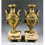 A Pair of Late 19th/Early 20th Century Gilt Metal Campagna-Shaped Urns, with gadrooned rims,