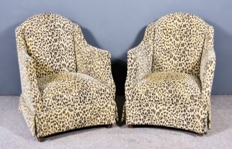 A Pair of Easy Chairs, upholstered in leopard print fabric, on square front legs First chair - the