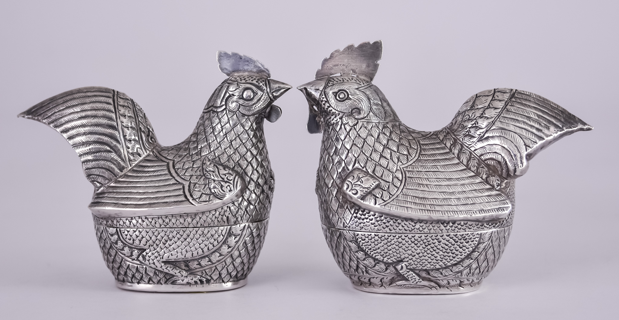 Two 20th Century Cambodian Silvery Metal Hen Shaped Betel Boxes and Covers, each naturalistically