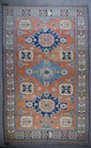 A 20th Century Anatolian Carpet of Kazac Design, sumac woven in muted colours with three bold