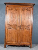 A 19th Century French Provincial Fruitwood Armoire, with moulded cornice, fitted two shelves, with