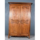 A 19th Century French Provincial Fruitwood Armoire, with moulded cornice, fitted two shelves, with