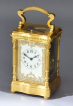 A Late 19th Century French Gilt Brass Carriage Clock No. 7549, the cream enamel dial with black